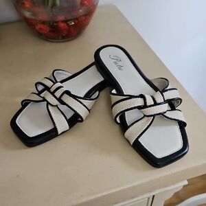 Elegant Black and Cream Knotted Sandals